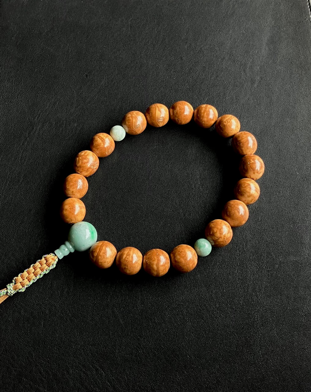 鳳眼菩提樹17ミリ18玉(無垢)単念珠翡翠仕立