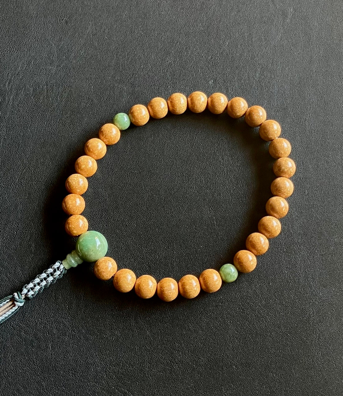 天竺菩提樹11.5ミリ27玉単念珠緑翡翠仕立