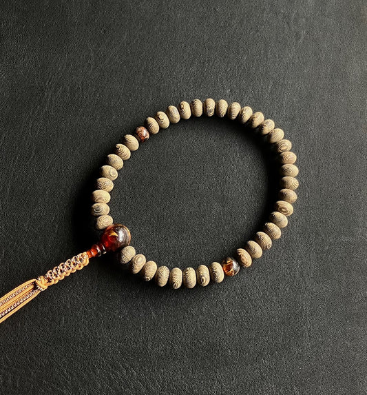 鉄刀木8x10ミリ単念珠虎琥珀仕立