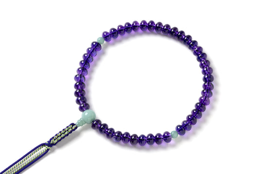 パープルクオーツ６ｘ９ミリ単念珠翡翠仕立