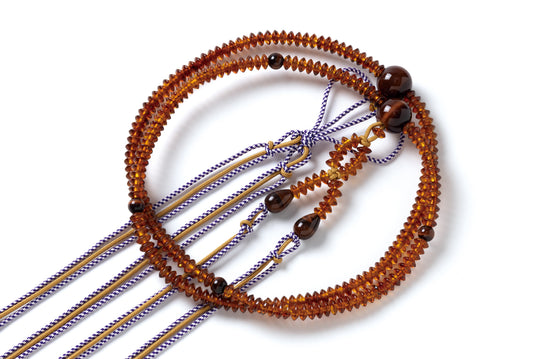 プレスドキャンディティーアンバー３×６ミリ尺一寸布教用念珠赤虎目仕立